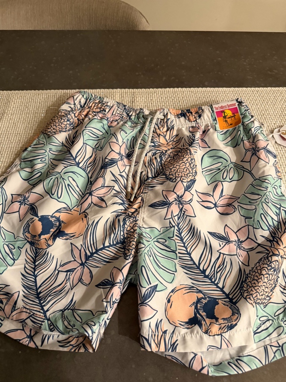 Men's Tropical Print Swim Trunks in Pastel Green & Peach